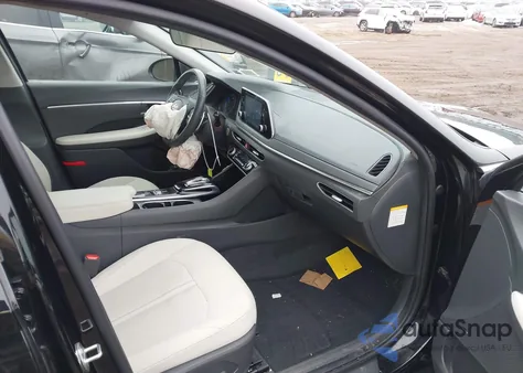 2022 Hyundai Sonata Hybrid Sel z USA, uszkodzony, nr VIN KMHL34JJXNA052509